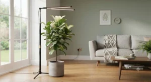 A modern, minimalist adjustable height grow light stand blending into a contemporary British living room interior.